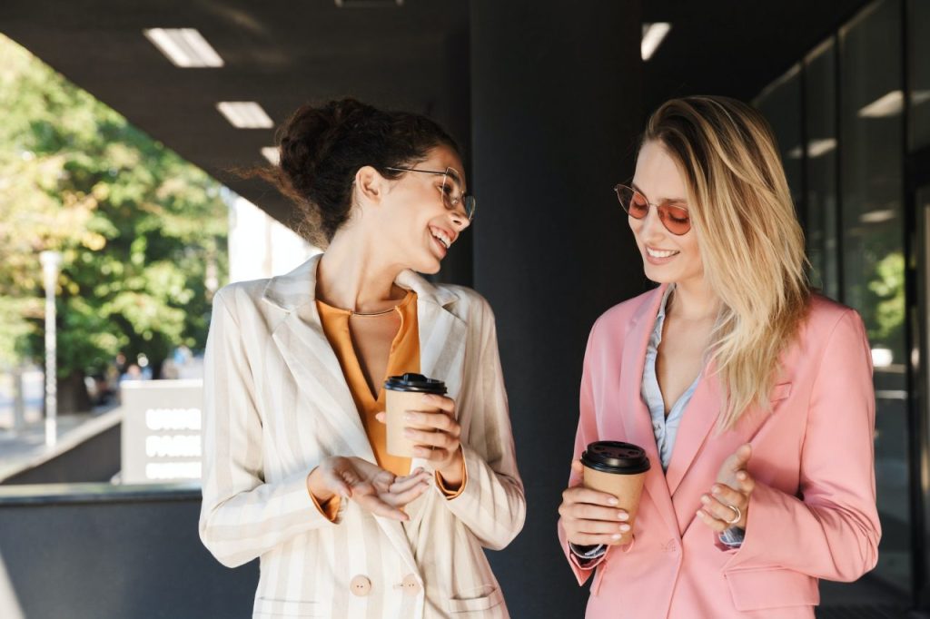 two-young-confident-happy-career-women-walking-outdoors.jpg